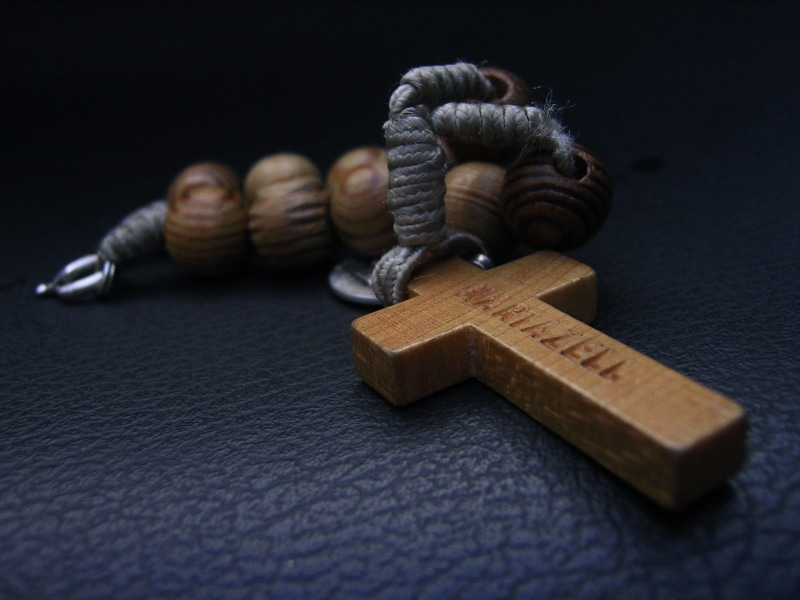 pray, close-up, christian, single object, religion, wooden cross, work tool, indoors, prayer, security, jesus, still life, protection, the rosary, crime