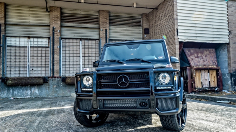 built structure, building, retro styled, no people, street, land vehicle, suv, old, car, garage, vintage car, architecture, motor vehicle, outdoors, city