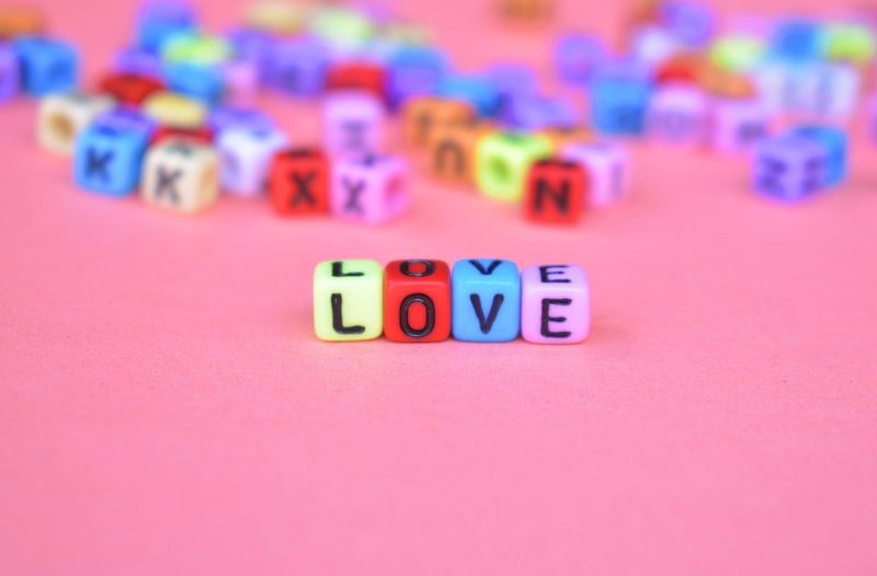 small, message, number, indoors, single word, close-up, woman, cute, communication, 4K, affection, girl, pink color, studio shot, alphabet, multi colored