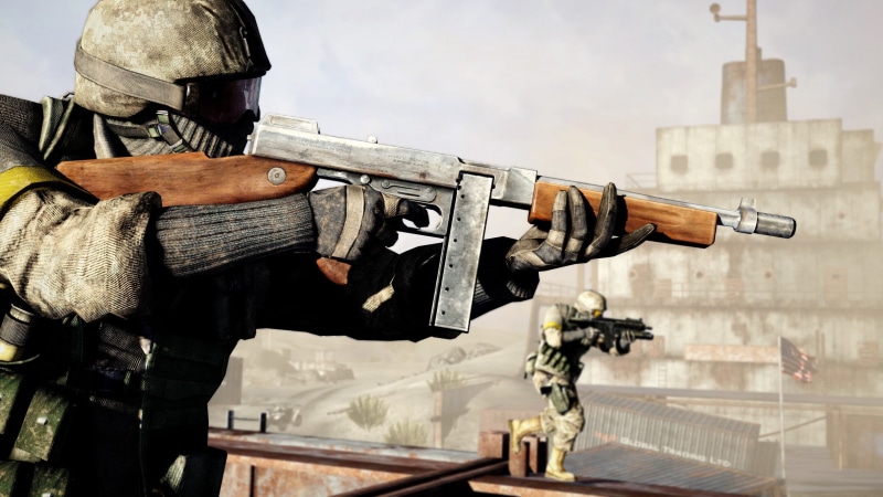 clothing, protection, weapon, aiming, machine gun, gun, holding, military, security, video games, real people, Battlefield Bad Company 2, rifle, table