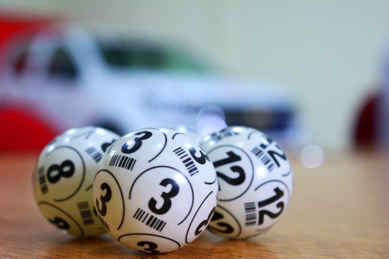 group of objects, lotto, still life, entertainment, indoors, opportunity, text, luck, winner, lottery, sphere, medium group of objects, sport, win, sweepstakes