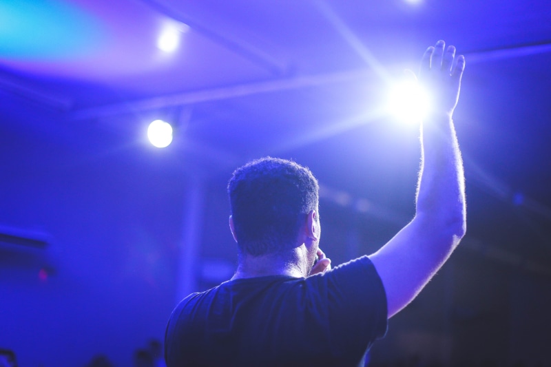 arts culture and entertainment, one person, bible, god, religion, back lit, stage light, stage, gospel, men, performance, stage - performance space, human limb
