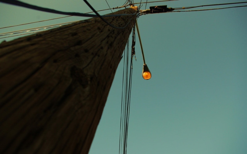 rope, electricity, sailboat, power lines, day, utility pole, sky, nature, water, worms eye view, focus on foreground, low angle view, close-up, 720P, clear sky