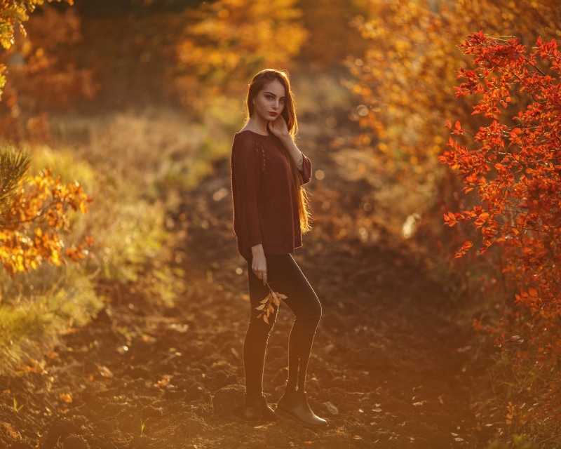 red lipstick, outdoors, women outdoors, land, full length, orange color, jeans, real people, 2K, fall, contemplation, portrait, standing, model, lifestyles