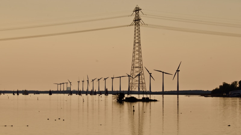 voltage, built structure, outdoors, industry, alternative energy, cable, beauty in nature, connection, danger, water, power, sky, trees, high voltage, fuel and power generation