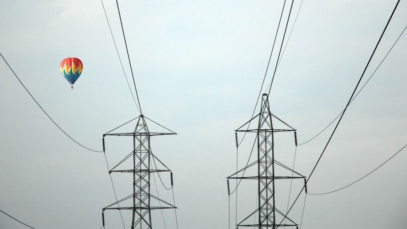 electricity pylon, connection, utility pole, multi colored, low angle view, nature, power lines, hot air balloons, technology, flying, hot air balloon