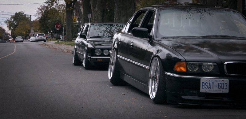 E38, motor vehicle, sedan, bumper, tuning, land Vehicle, chrome, parking Lot, exhibition, car, outdoors, headlight, luxury, street, classic, damaged, tail light