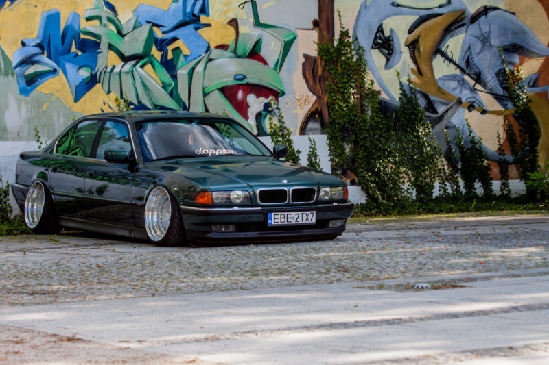 chrome, stationary, competition, Classic, outdoors, day, built structure, car, E38, plant, style, engine, city, transportation, grille, road, shiny, sport