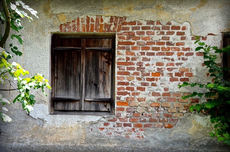 built structure, entrance, closed, plant, abandoned, stone, architecture, residential district, vintage, brick wall, day, construction, door, family, no people