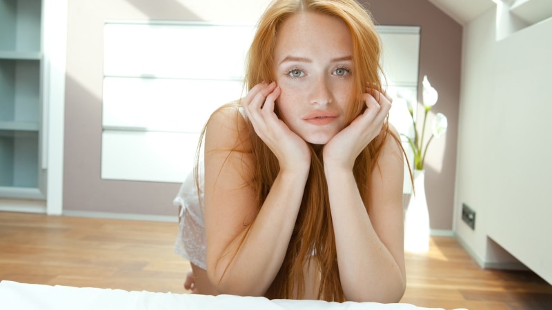 young women, young adult, freckles, s, 1080P, babydoll, beautiful woman, hand on chin, looking at camera, sadness, portrait, parquet floor, hair, adult