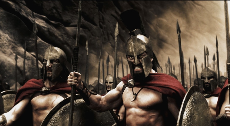 300, men, human representation, male likeness, art and craft, wall - building feature, screenshot, real people, sculpture, movie, holding, creativity, representation