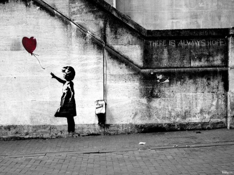 adult, footpath, clothing, architecture, one person, building exterior, holding, graffiti, standing, black, day, casual clothing, full length, real people