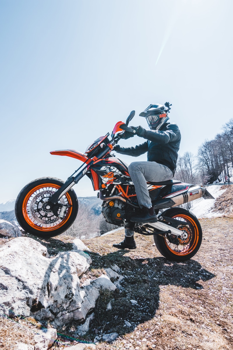 leisure activity, risk, mode of transportation, outdoors, vehicle, motocross, nature, apparel, real people, machine, 5K, headwear, leisure activities