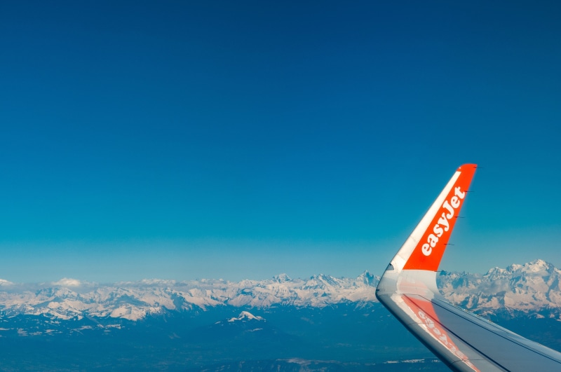 wing, snow, clear sky, outdoors, beauty in nature, aircraft, travel, blue, no people, copy space, snowcapped mountain, sky, adventure, glider, horizon