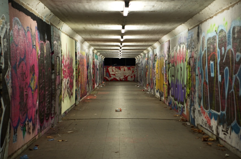 diminishing perspective, vandalism, absence, run down, corridor, footpath, railway underpass, creativity, empty, garbage, painted, concrete, street art