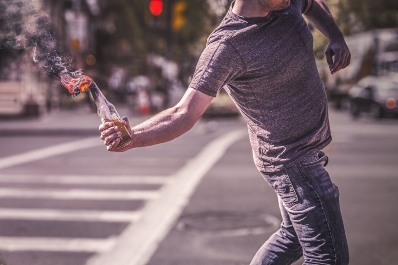 men, adult, molotov, body part, one Person, urban, casual clothing, exercising, human limb, protest, human arm, city Life, leisure activity, adults only