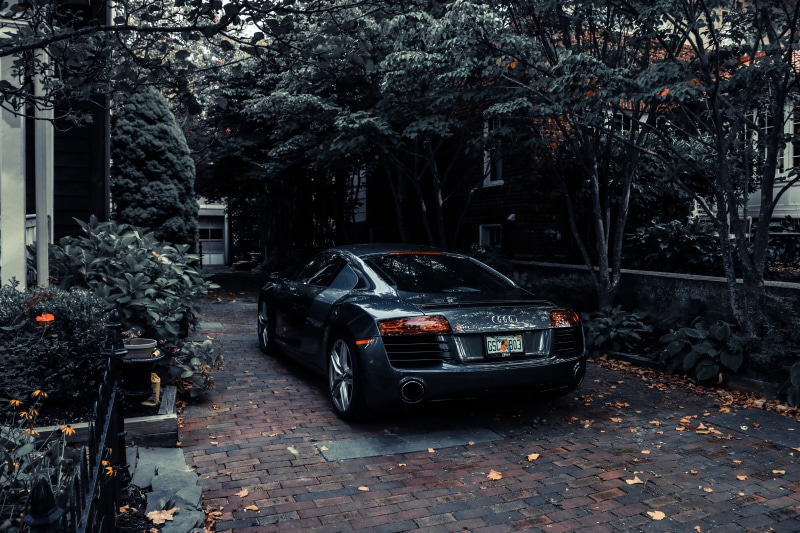 car, plant, plant part, motor vehicle, land vehicle, architecture, stationary, tree, street, transportation, building exterior, day, nature, outdoors, autumn