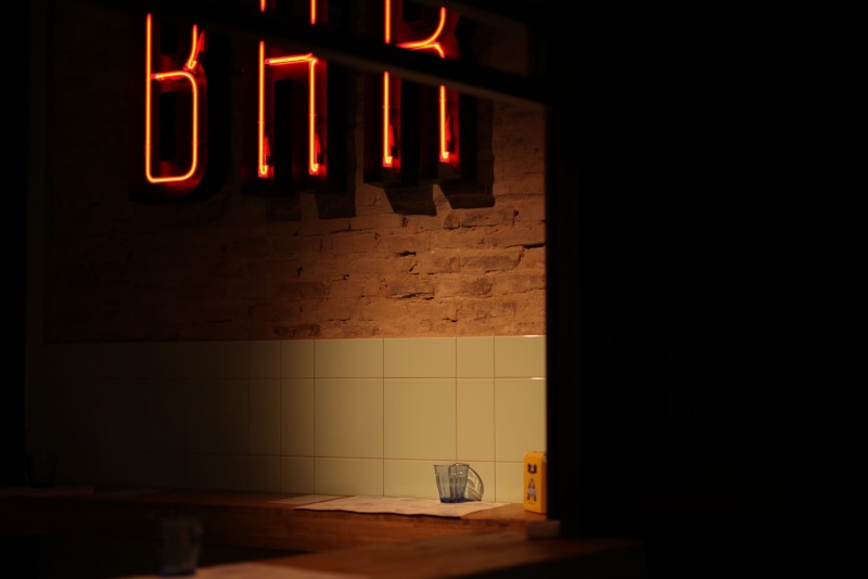pc, text, capital letter, nightlife, no people, western script, absence, signage, light - natural phenomenon, illuminated, wheel, wall - building feature
