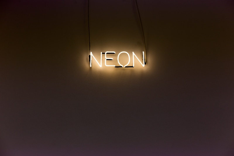 electricity, neon, wall - building feature, sign, low angle view, no people, lights, luminosity, wall, 5K, lighting equipment, number, signage, text, turned