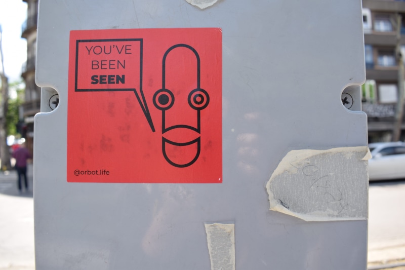 symbol, close-up, outdoors, art, no people, plastic bag, shape, car, focus on foreground, flyer, day, brochure, 5K, western script, advertisement, sticker