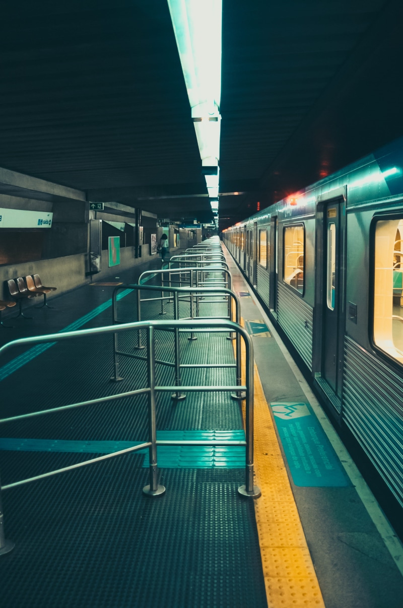 indoors, railroad station, rail, transportation system, train, subway train, commuter, public transportation, building, locomotive, mode of transportation