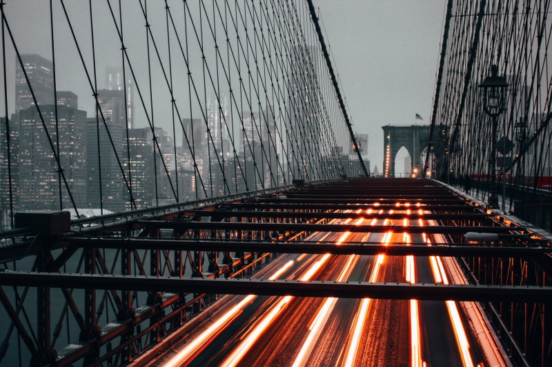 Car, skyscraper, transportation, outdoors, no people, long exposure, modern, built Structure, building, famous Place, New York City, connection, steel Cable