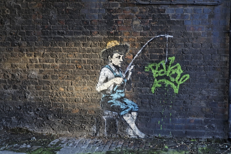 representation, art and craft, brick wall, no people, Banksy, architecture, day, damaged, built structure, brick, craft, male likeness, person, wall - building feature