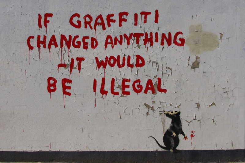 wall - building feature, vertebrate, graffiti, architecture, red, one animal, 2K, communication, wall, urban, built structure, Banksy, text, western script