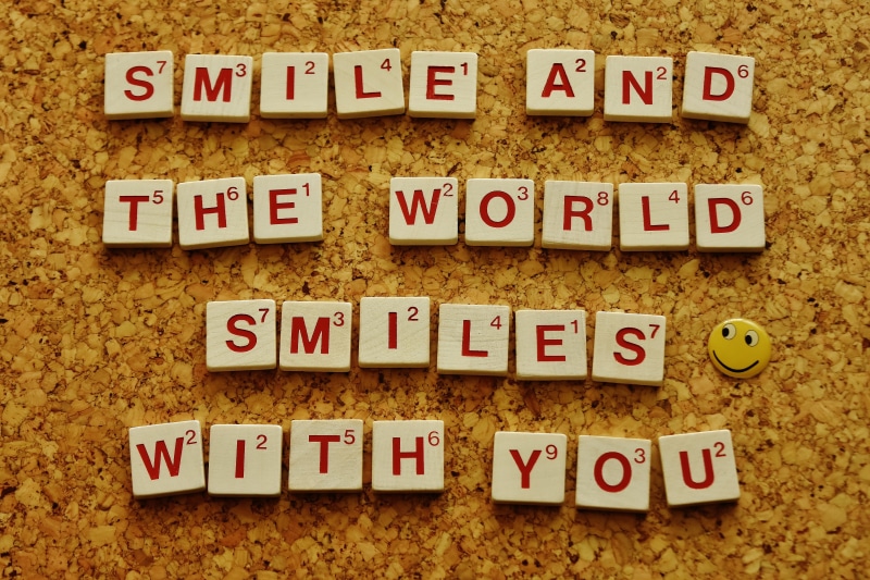text, happiness, emoticon, large group of objects, alphabet, scrabble, start, beginning, saying, wood - material, happy, positive, paper, capital letter