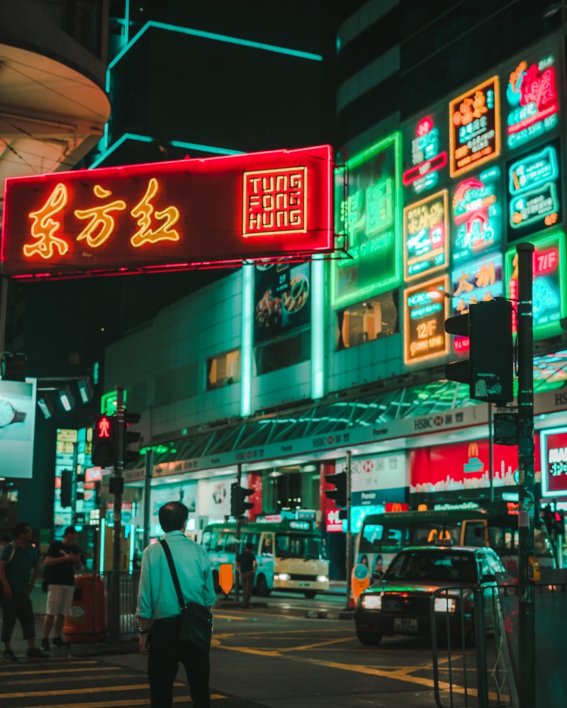bus, sign, architecture, light, walking, street, road, time, illuminated, transportation, neon sign, car, mode of transportation, red, cyberpunk, people