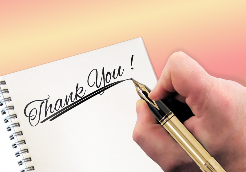 copy space, close-up, text, you rock, hand, writing instrument, studio shot, colored background, communication, labels, business, western script, pen, finger
