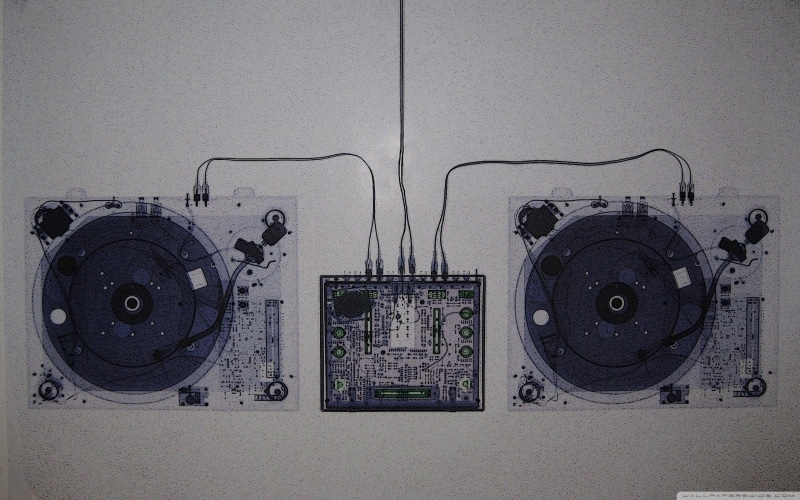table, listening, accuracy, music, still life, connection, arts culture and entertainment, black, turntables, white, controller, indoors, dj, machinery