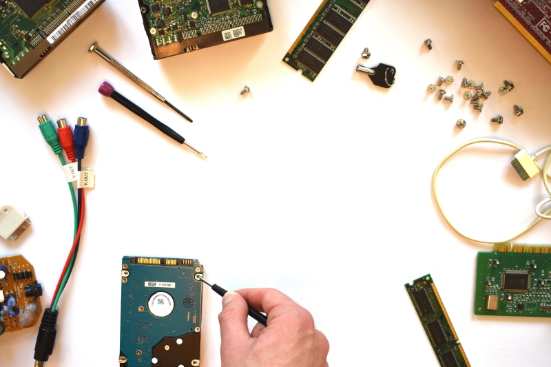 work, brush, electronics industry, white background, holding, pc, hand, finger, working, equipment, hardware, engineer, computer service, people, electrical equipment