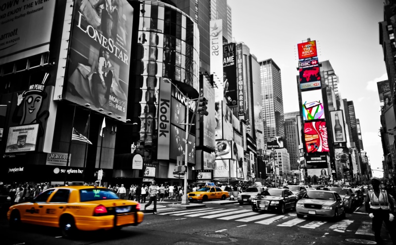 building, motion, cityscape, motor vehicle, photography, street, sign, selective, no people, square, mode of transportation, color, new york city, built structure