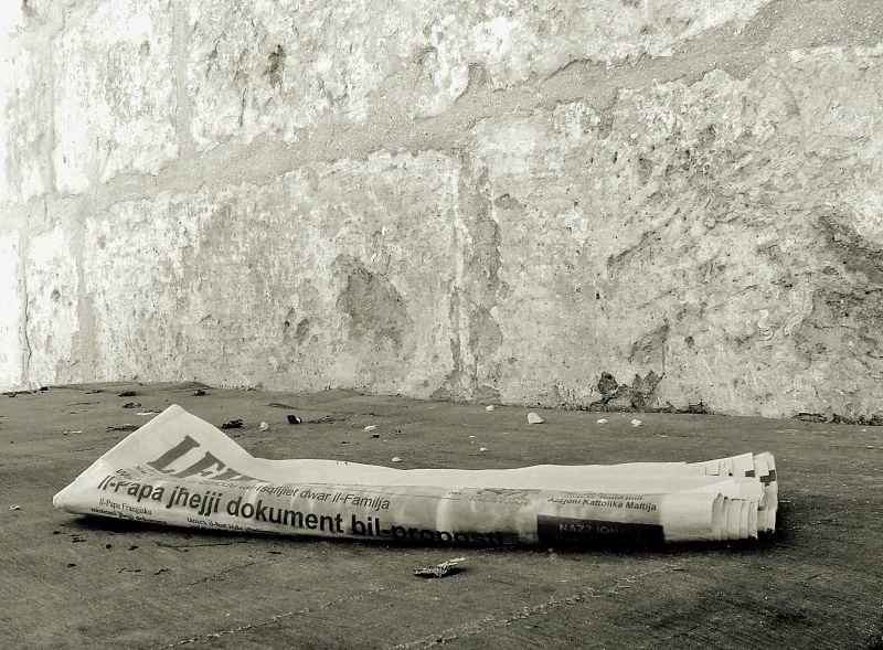 business, floor, headline, solid, media, plant, black, western script, outdoors, concrete, discarded, newsprint, nature, wall - building feature, land