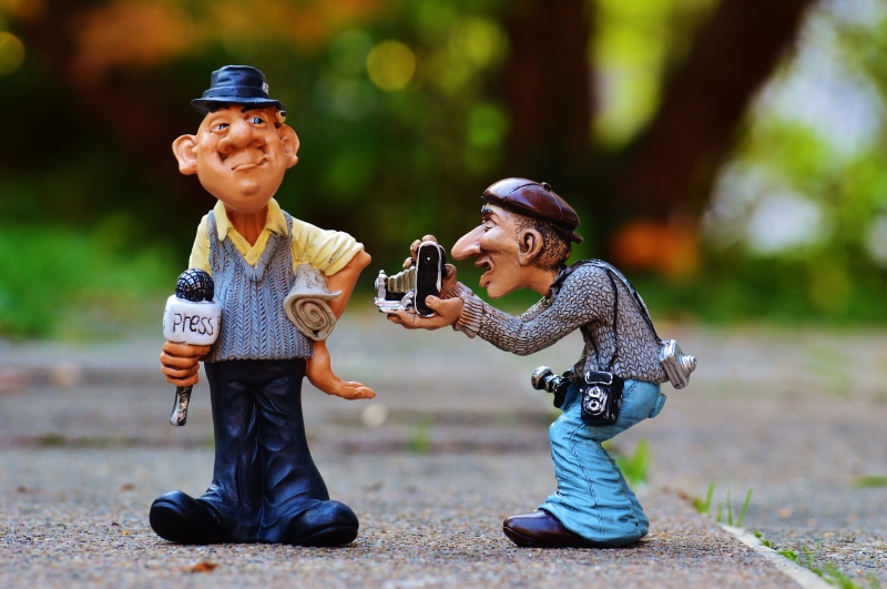 funny, press, sister, journalist, information, innocence, front view, magazines, day, happiness, casual clothing, tagesschau, outdoors, autumn, journalism