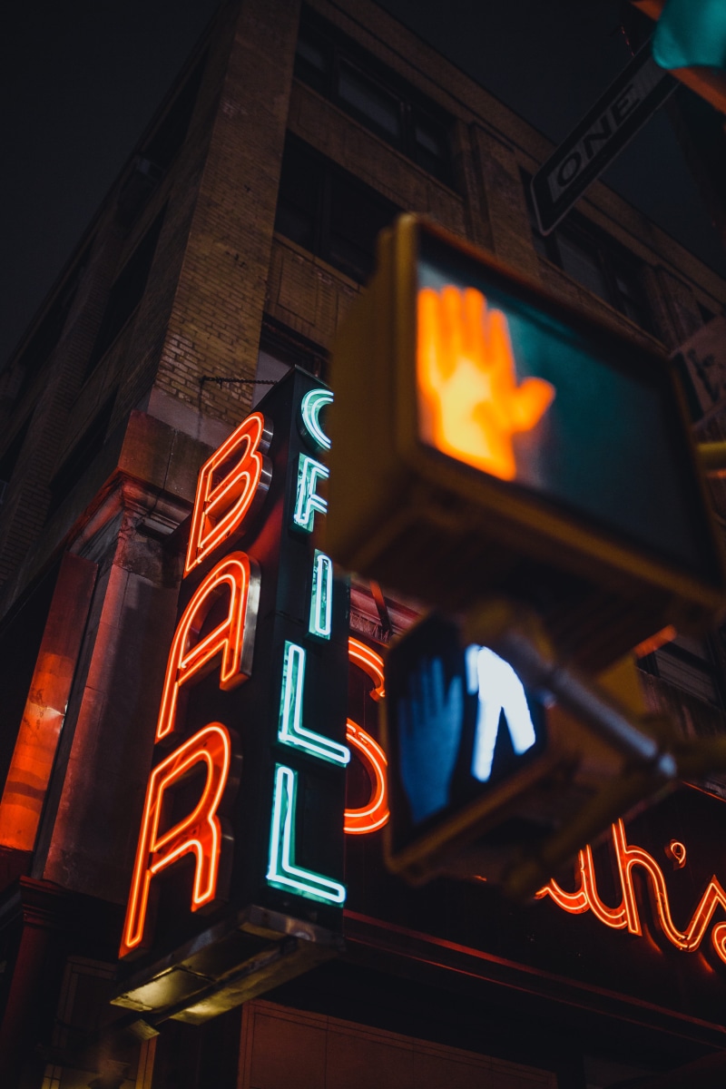 low angle view, signalise, building exterior, grill, neon, night, store, neon lights, symbol, architecture, food and drink, low angle shot, close-up, graphic