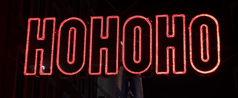 night, close-up, road sign, capital letter, orthographic symbol, lighting equipment, glowing, sign, western script, red, scoreboard, light, street, information sign