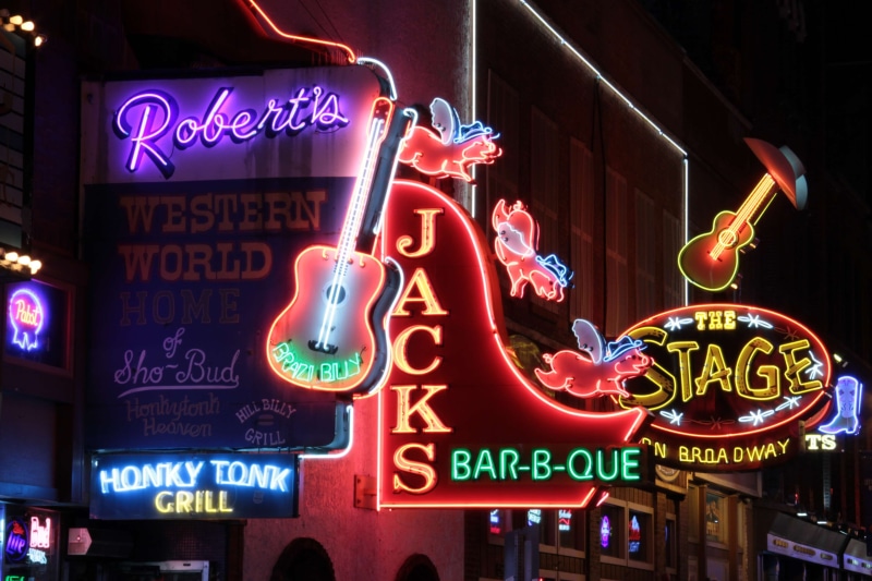 glowing, on broadway, neon lights, bar b que, text, broadway, neon sign, building exterior, restaurant, architecture, food and drink, jacks, city, neon colored