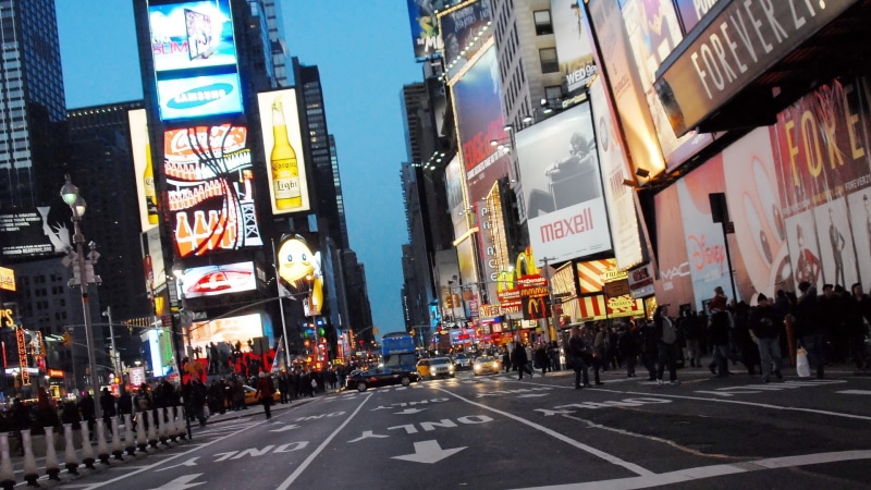road marking, city street, real people, skyscraper, city life, text, sign, symbol, modern, road, large group of people, group of people, street, New York City