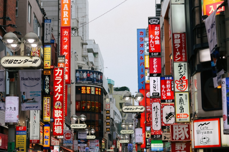 architecture, outdoors, text, tokyo, shibuya, communication, no people, sign, shibuya station, script, city life, building, japan, commercial sign, built structure