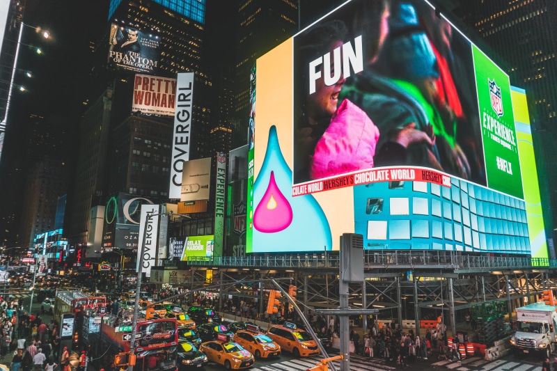 night, office building exterior, billboard, text, building, neon, explore, street, traffic lights, person, times square, night time, dream, outdoors, modern