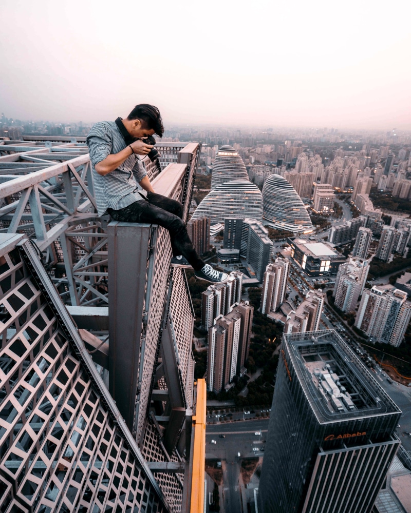 urban Skyline, lifestyles, taking, looking, built Structure, person, downtown District, business, roof, famous Place, architecture, outdoors, sunset, day