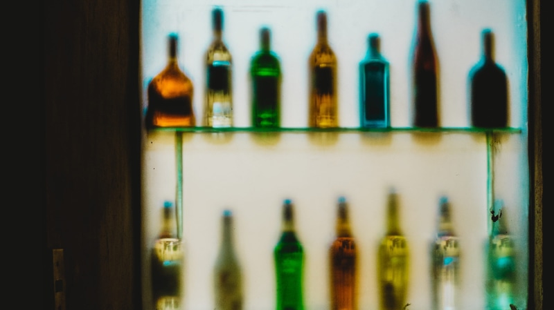 banister, drink, container, reflection, beer, wine bottle, in a row, transparent, still life, bar counter, side by side, business, absinthe, no people