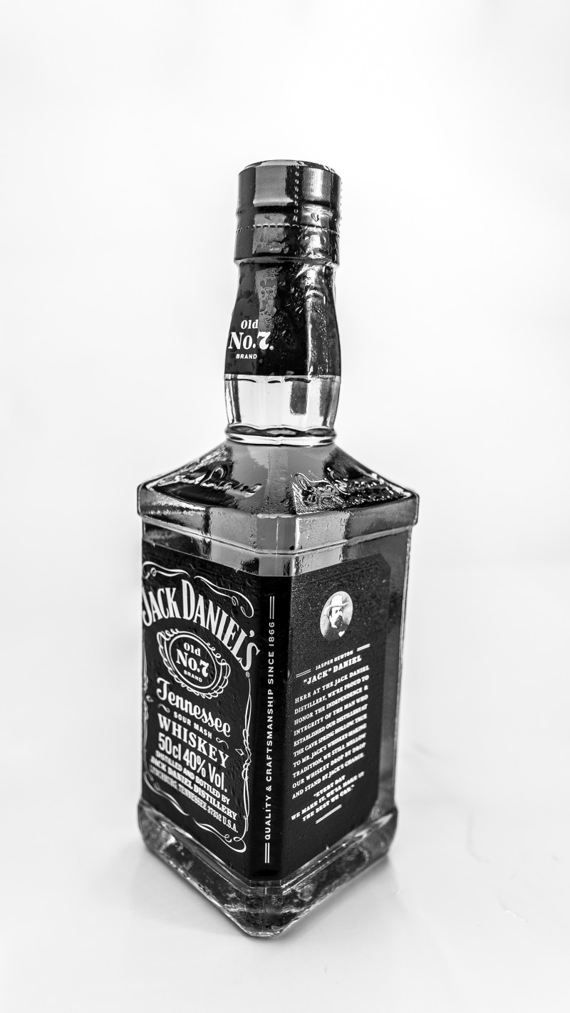 container, studio shot, single object, label, transparent, s, indoors, alcoholic drinks, cut out, personal accessory, bourbon, wealth, close-up, metal