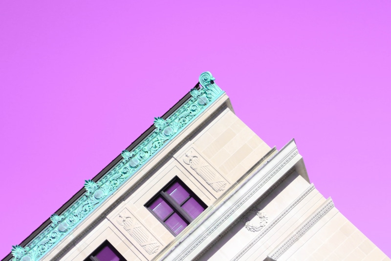 pink background, turquoise colored, architecture, wealth, pink color, building, buiding, colored background, paper currency, building exterior, sky, minimalism