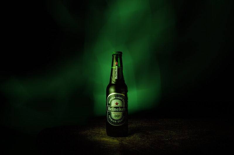 container, beer, lager, 5K, alcohol, glass - material, lighting equipment, spotlight, beer bottle, bottle, heineken, indoors, drink, studio shot, green color