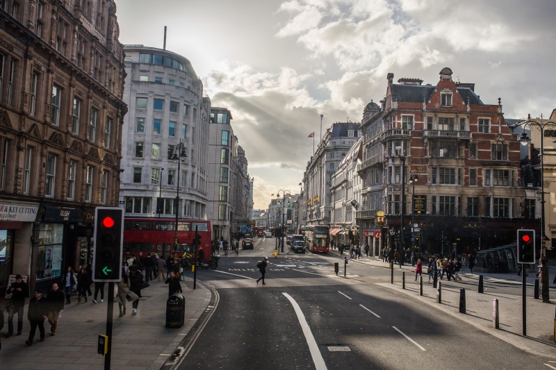people, bus, building Exterior, diminishing perspective, light, double-Decker Bus, road, building, marking, city street, road marking, city, transportation