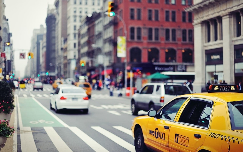 New York City, land vehicle, symbol, sign, busy, taxi, built structure, road, building exterior, city life, outdoors, city, mode of transportation, architecture