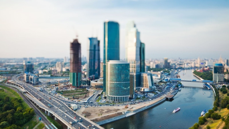 reflection, business, rise, blue, financial district, architecture, travel destinations, water, tilt shift, river, no people, skyscraper, aerial View, sky